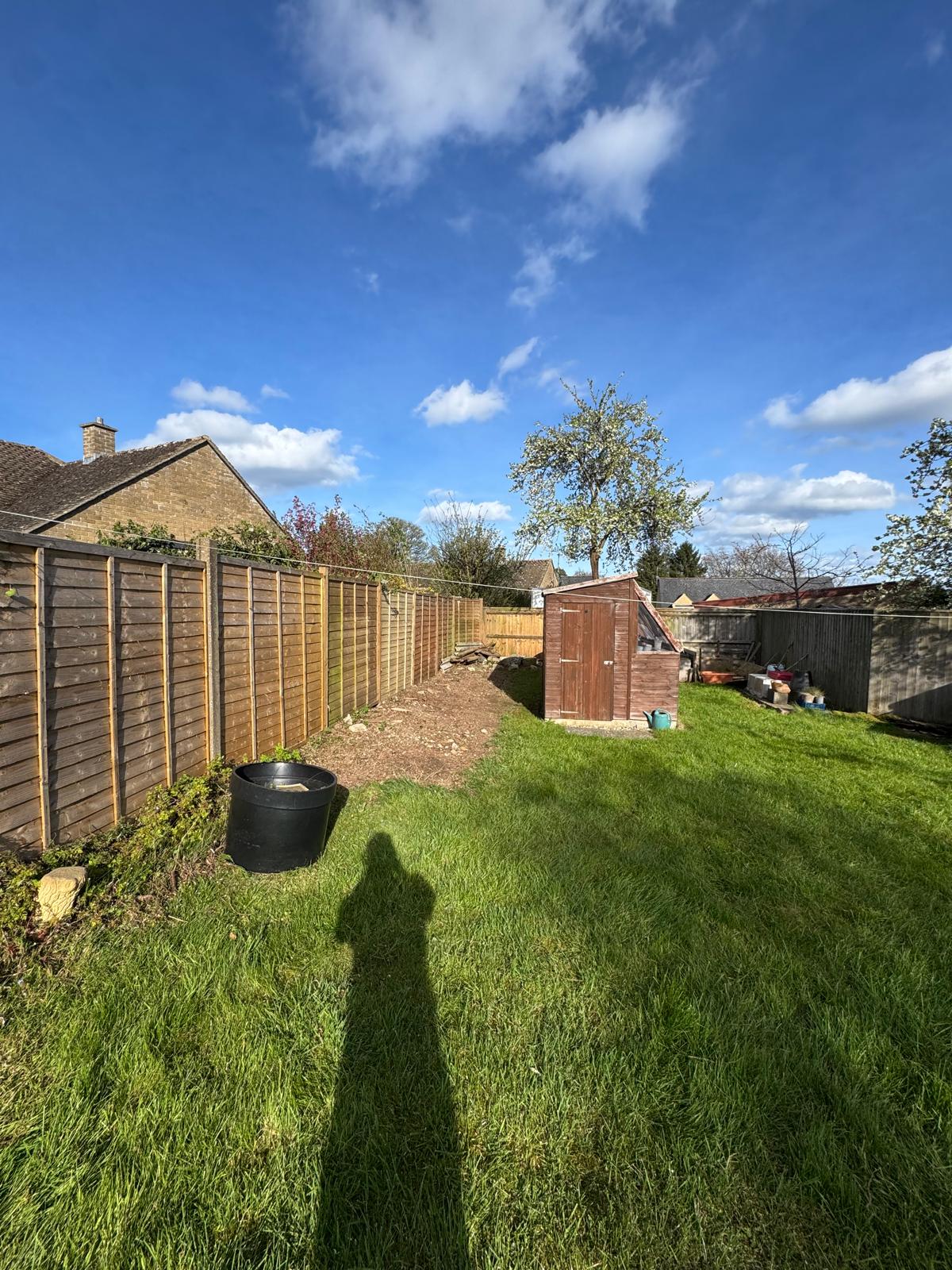 Garden cleared with hedge fully removed
